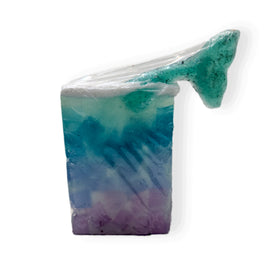 a bar of soap with a mermaid fin at the top