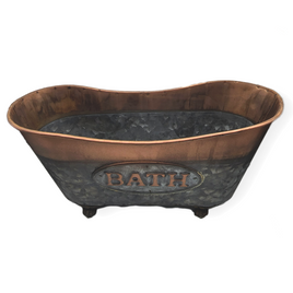 a copper and grey replical metal bath tub