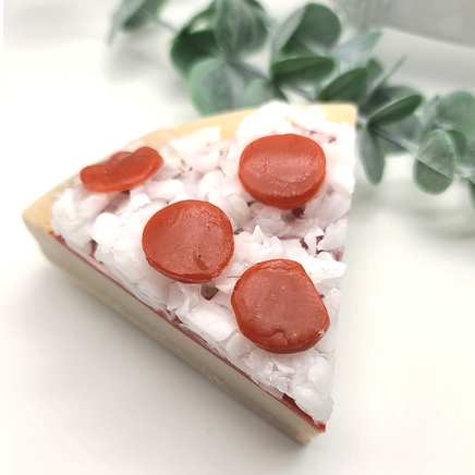soap designed to appear as a pepperoni pizza pie slice
