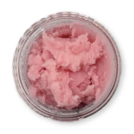 an open jar of pink body scrub