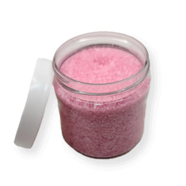an open jar of pink rose hibiscus bath gel